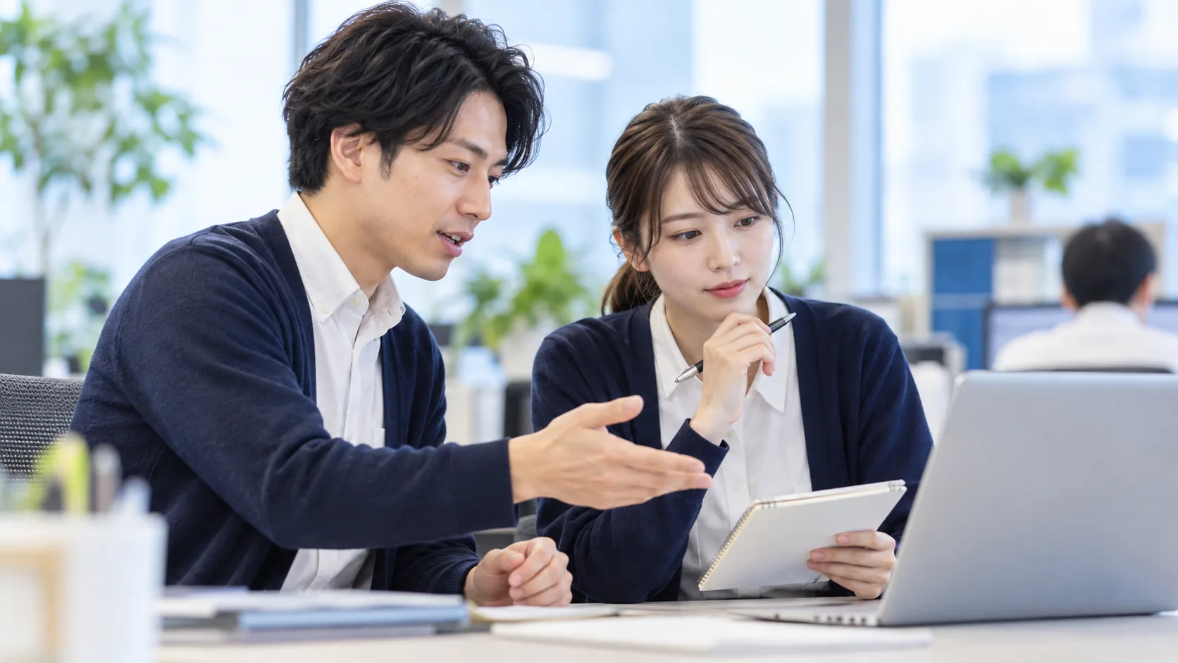現場でAI運用の手順を確認する担当者たちのイメージ(AI生成)